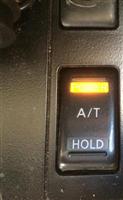 Nút A/T trên xe Nissan Patrol có ý nghĩa gì?